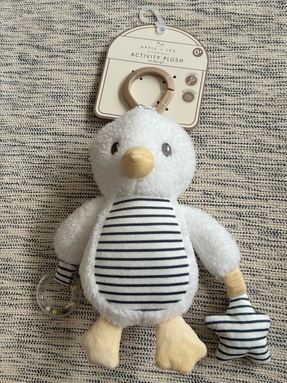 NWT Apple + Ivy White Penguin Activity Plush & teething toy. Brand new.